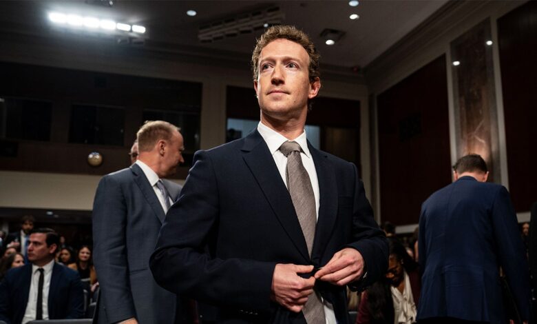 Zuckerberg posing for camera