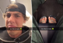 Plane passenger who won't move feet gets 'instant karma': video