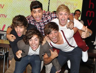 Louis Tomlinson 'Could Never' Perform With 1D Again, PR Manager Says