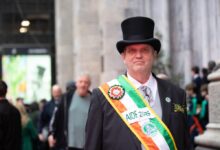 Aide to the Marshall Bill Corrighan of the Queens County Ancient Order of Hibernians is seen preparing for St. Patrick's Day on the steps of St. Patrick's Cathedral.