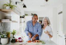 Happy older couple cooking