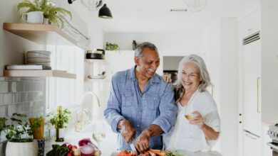 Happy older couple cooking