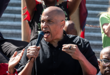 Sen. Cory Booker, D-N.J., speaks during a livestreamed sit-in against the GOP funding plan on the steps of the House of Representatives on April 27, 2025, in Washington, D.C.