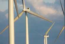 Wind turbines standing tall on a farm in Lowville, New York, August 24, 2006.