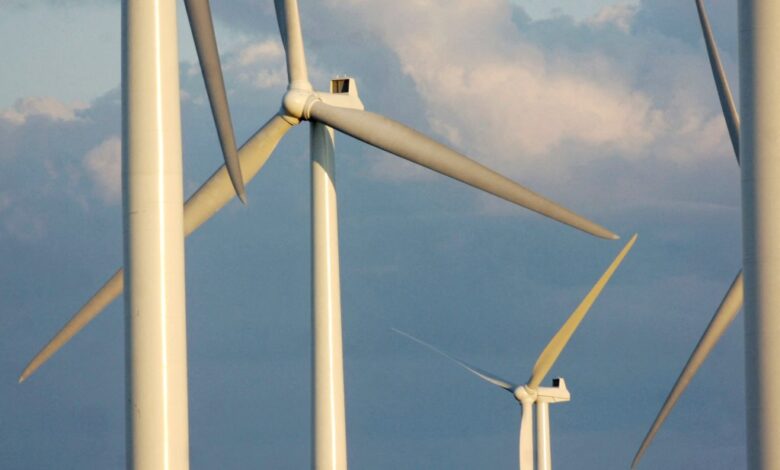 Wind turbines standing tall on a farm in Lowville, New York, August 24, 2006.