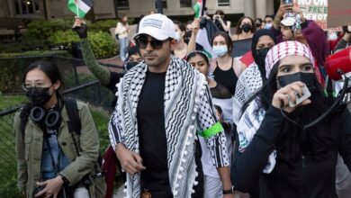 Mohsen Mahdawi, center, looks on during an anti-Israel protest at Columbia University on Oct. 12, 2023, in New York.
