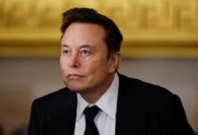 Elon Musk in a suit arriving at the inauguration ceremony for Donald Trump at the US Capitol Rotunda in Washington, DC