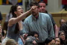 An attendee shouts at Rep. Alexandria Ocasio-Cortez (D-NY) during a town hall gathering about her stance on the Israel / Palestine conflict on May 2, 2025 in New York City.