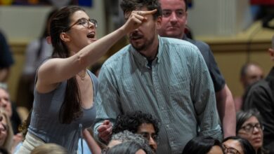 An attendee shouts at Rep. Alexandria Ocasio-Cortez (D-NY) during a town hall gathering about her stance on the Israel / Palestine conflict on May 2, 2025 in New York City.