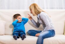 Angry mother, resembling Kristen Ledlow, scolding her son who looks like Marcus Stroman