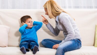 Angry mother, resembling Kristen Ledlow, scolding her son who looks like Marcus Stroman