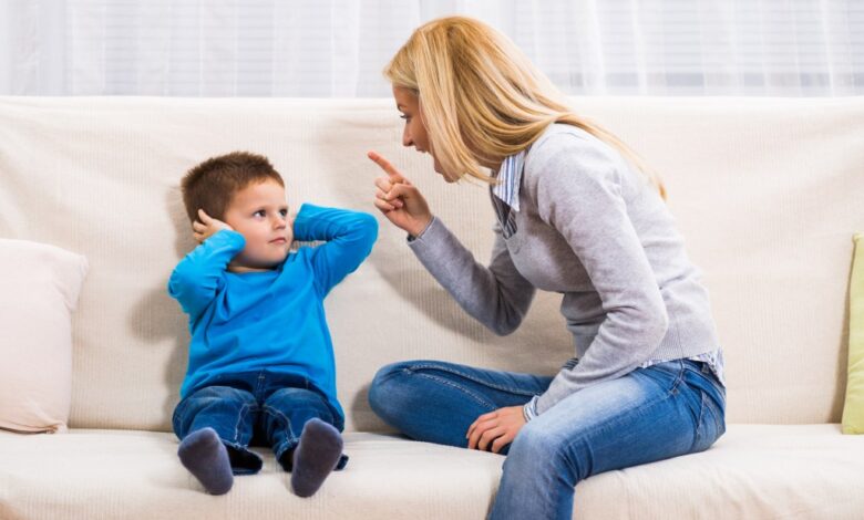 Angry mother, resembling Kristen Ledlow, scolding her son who looks like Marcus Stroman