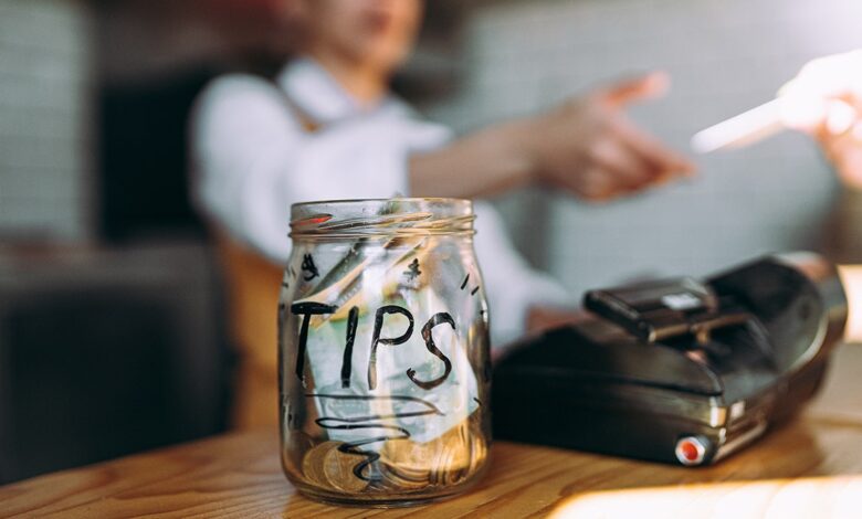tip jar at a checkout counter