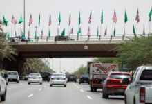 flags on overpass in Riyadh