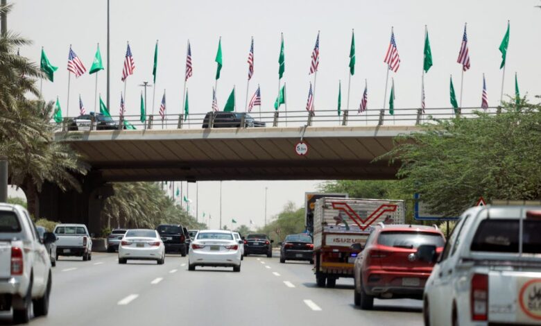 flags on overpass in Riyadh