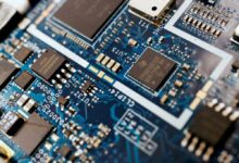 Semiconductor chips are seen on a circuit board