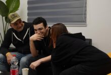 Edan Alexander speaks with loved ones following his release.