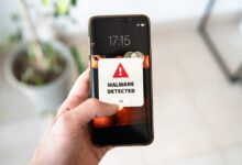 Smartphone displaying a new malware alert notification