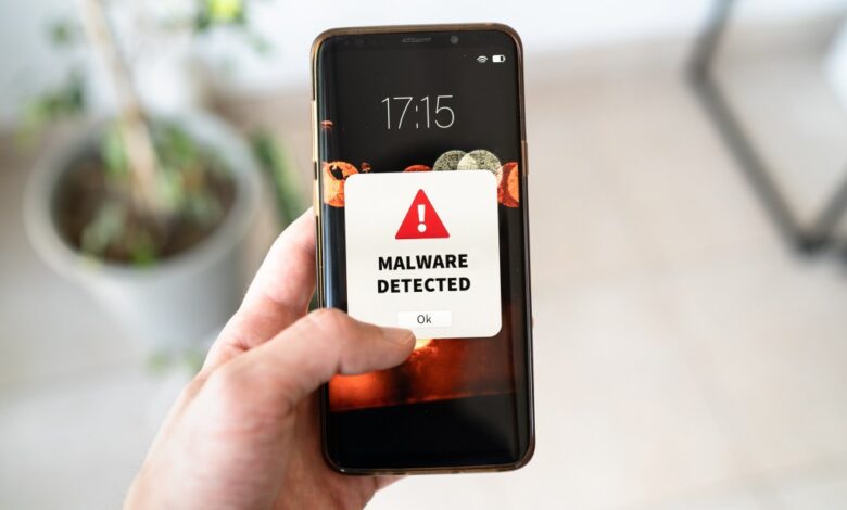 Smartphone displaying a new malware alert notification