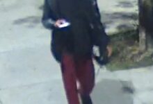 Surveillance image of a man wanted for questioning in connection with a forcible touching.