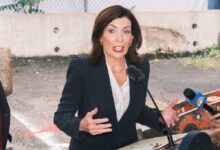 New York Governor Kathy Hochul and New Jersey Governor Phil Murphy symbolically shovel dirt to announce Port Authority Bus Terminal renovation.