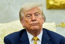 Trump in the Oval Office with a serious face