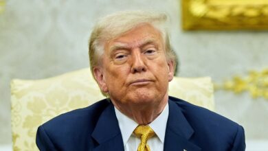 Trump in the Oval Office with a serious face