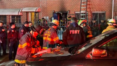 Firefighters and police responding to a fire in the Bronx.