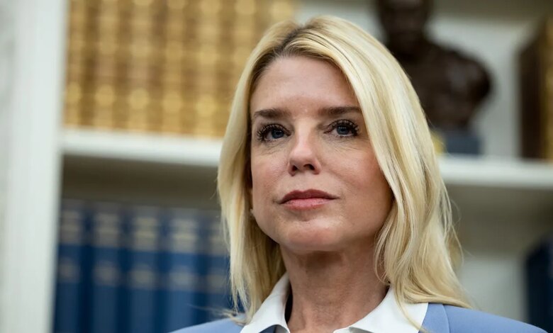 Attorney General Pam Bondi wearing blue.