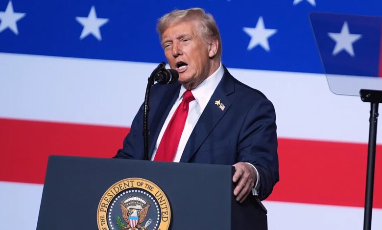 Donald Trump speaking to military senior leaders with American flag backdrop