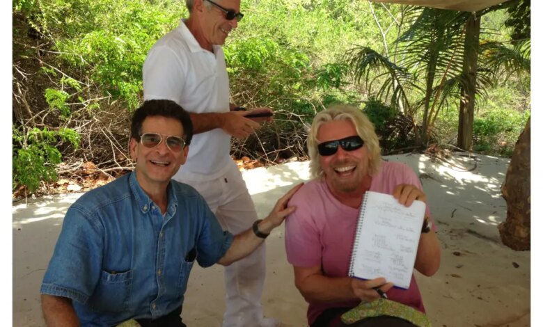 Michael Goodwin: This latest batch of little-detailed Jeffrey Epstein photos proves it's time to end the bipartisan obsession 1 Richard Branson, Jeffrey Epstein, and another man under a canopy.