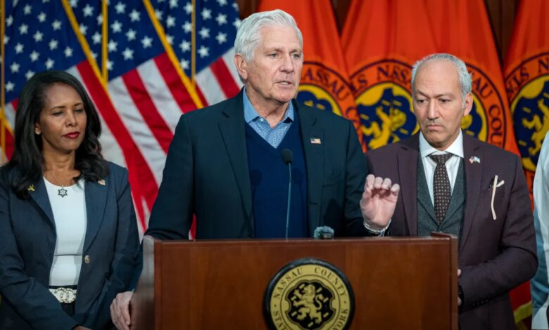 Nassau County Executive Bruce Blakeman and Legislator Mazi Pilip with a business leader.