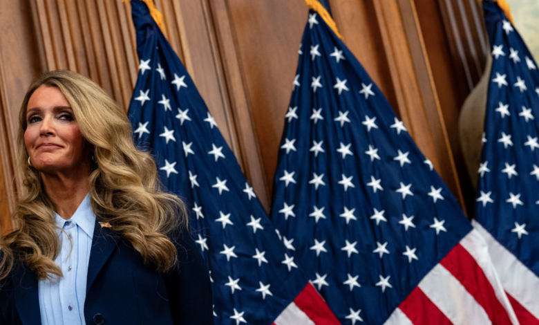 SBA chief Kelly Loeffler listens during. a news conferences in Washington, DC