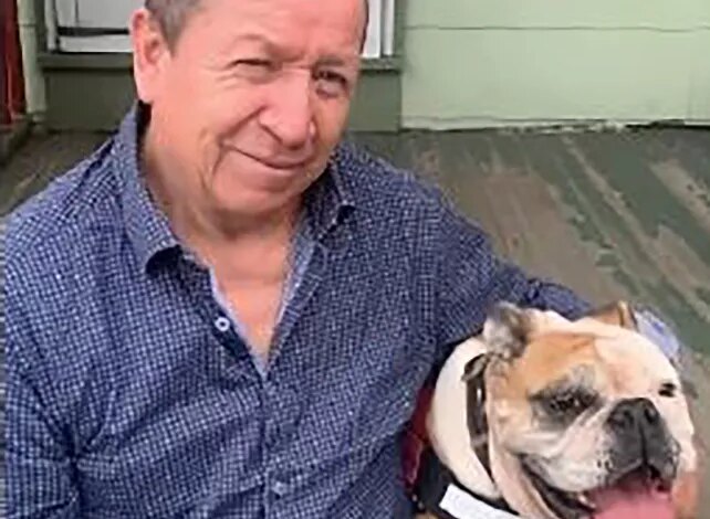 Aurelio Zhunio-Orbez with his dog.