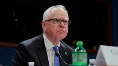 Gov. Tim Walz listening.