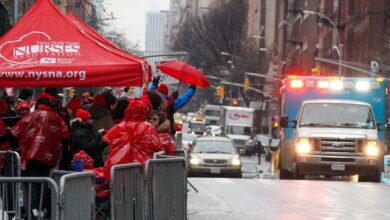 nurses on strike picketing outside hospital