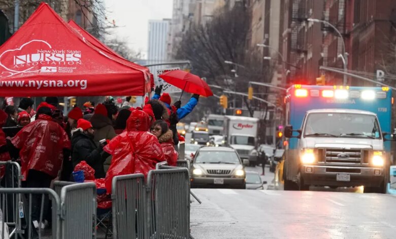 nurses on strike picketing outside hospital