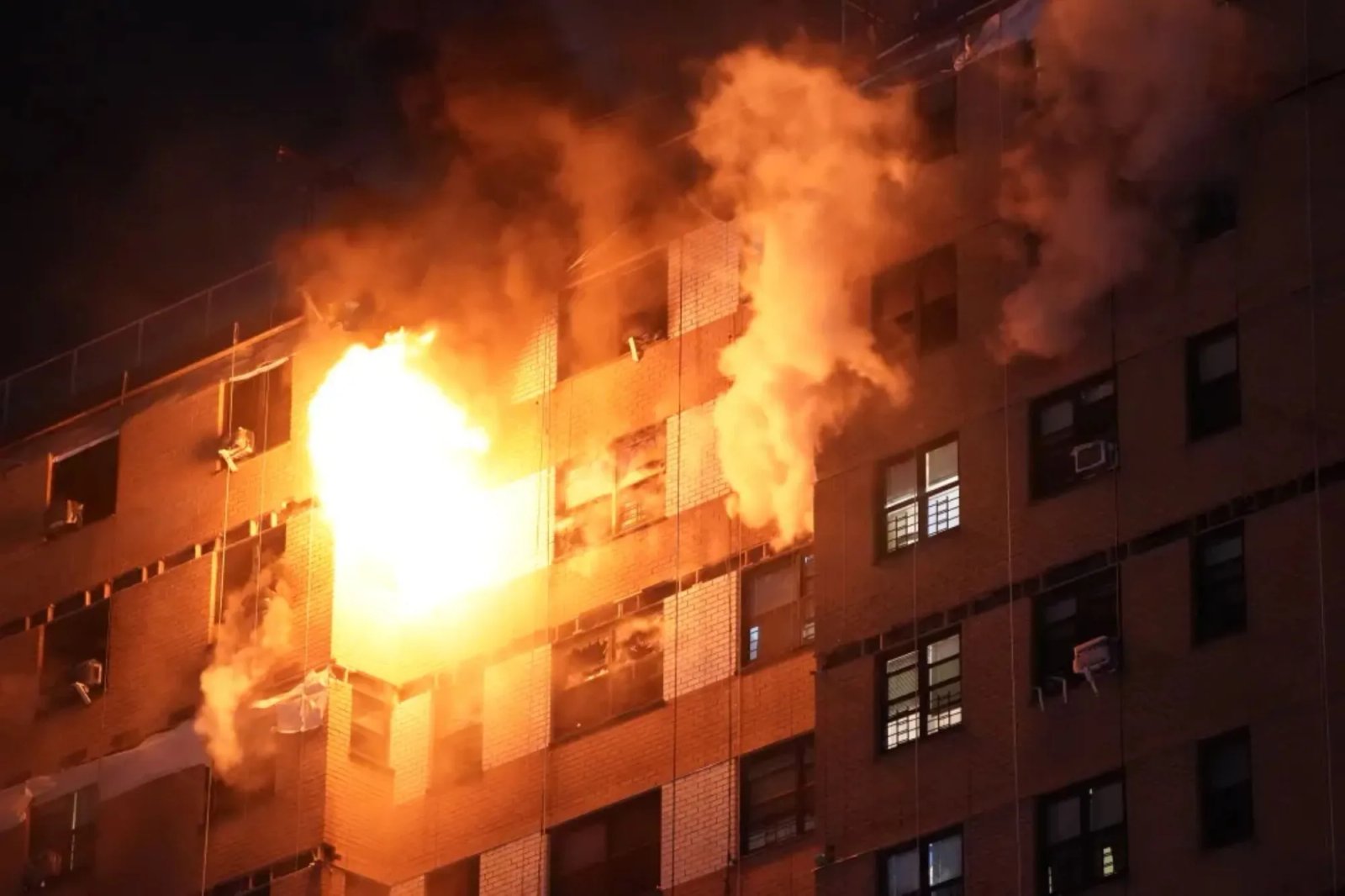 FDNY firefighters battle 4-alarm blaze on top floors of Bronx apartment ...