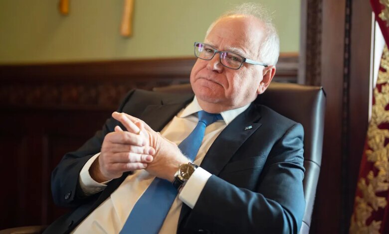 Minnesota governor speaks with local reporters during an in-office media interview.