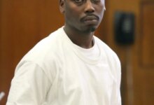 Cornell Neilly walking to a courtroom for his arraignment.