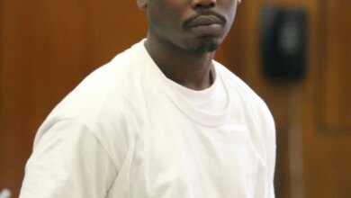 Cornell Neilly walking to a courtroom for his arraignment.