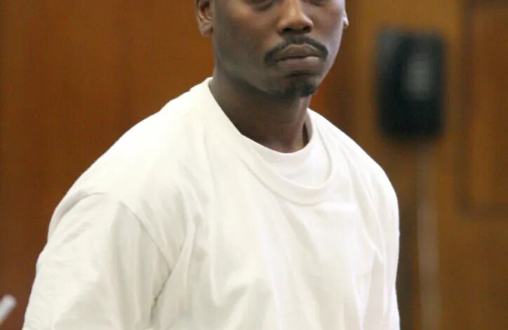 Cornell Neilly walking to a courtroom for his arraignment.