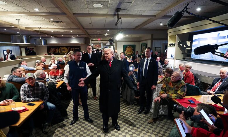 President Trump greets Iowa restaurant patrons