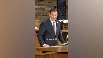 protester-ny-tom-suozzi