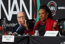 Teachers warm themselves beside partisan cash bonfire