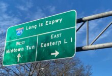 Interstate 495, Long Island Expressway, LIE, road sign with directions to New York City or Long Island.