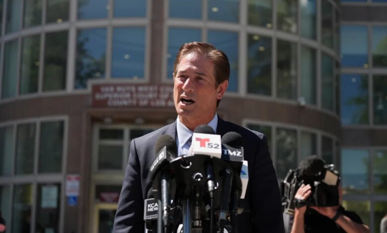 Los Angeles County District Attorney Nathan Hochman speaks to reporters outside the courthouse.