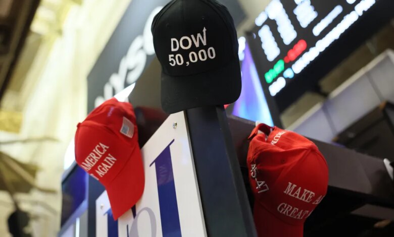 MAGA hats are hung on a wall as traders work on the floor of the New York Stock Exchange during morning trading on February 20th.