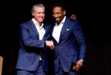 Mandatory Credit: Photo by ERIK S LESSER/EPA/Shutterstock (16692428q) Democratic California Governor Gavin Newsom (L) with Atlanta Mayor Andre Dickens (R) during his 'Young Man in a Hurry: A Memoir of Discovery' book tour stop in Atlanta, Georgia, USA, 22 February 2026. The autobiographical book will be released 24 February 2026. Gavin Newsom promotes 'Young Man in a Hurry: A Memoir of Discovery' book in Georgia, Atlanta, USA - 22 Feb 2026