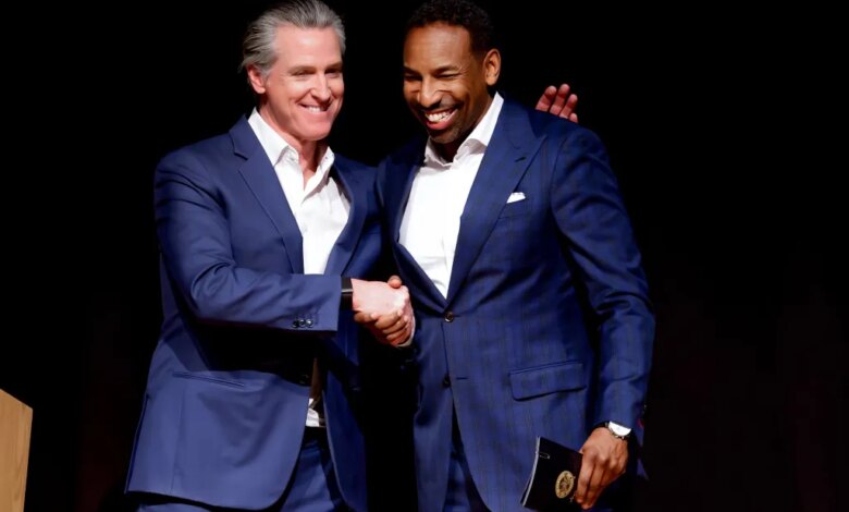 Mandatory Credit: Photo by ERIK S LESSER/EPA/Shutterstock (16692428q) Democratic California Governor Gavin Newsom (L) with Atlanta Mayor Andre Dickens (R) during his 'Young Man in a Hurry: A Memoir of Discovery' book tour stop in Atlanta, Georgia, USA, 22 February 2026. The autobiographical book will be released 24 February 2026. Gavin Newsom promotes 'Young Man in a Hurry: A Memoir of Discovery' book in Georgia, Atlanta, USA - 22 Feb 2026